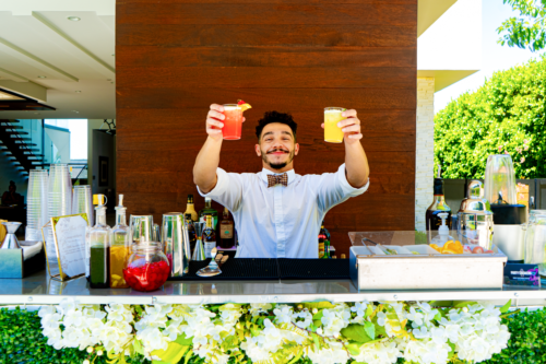 Bartender with cocktails | Party Shakers